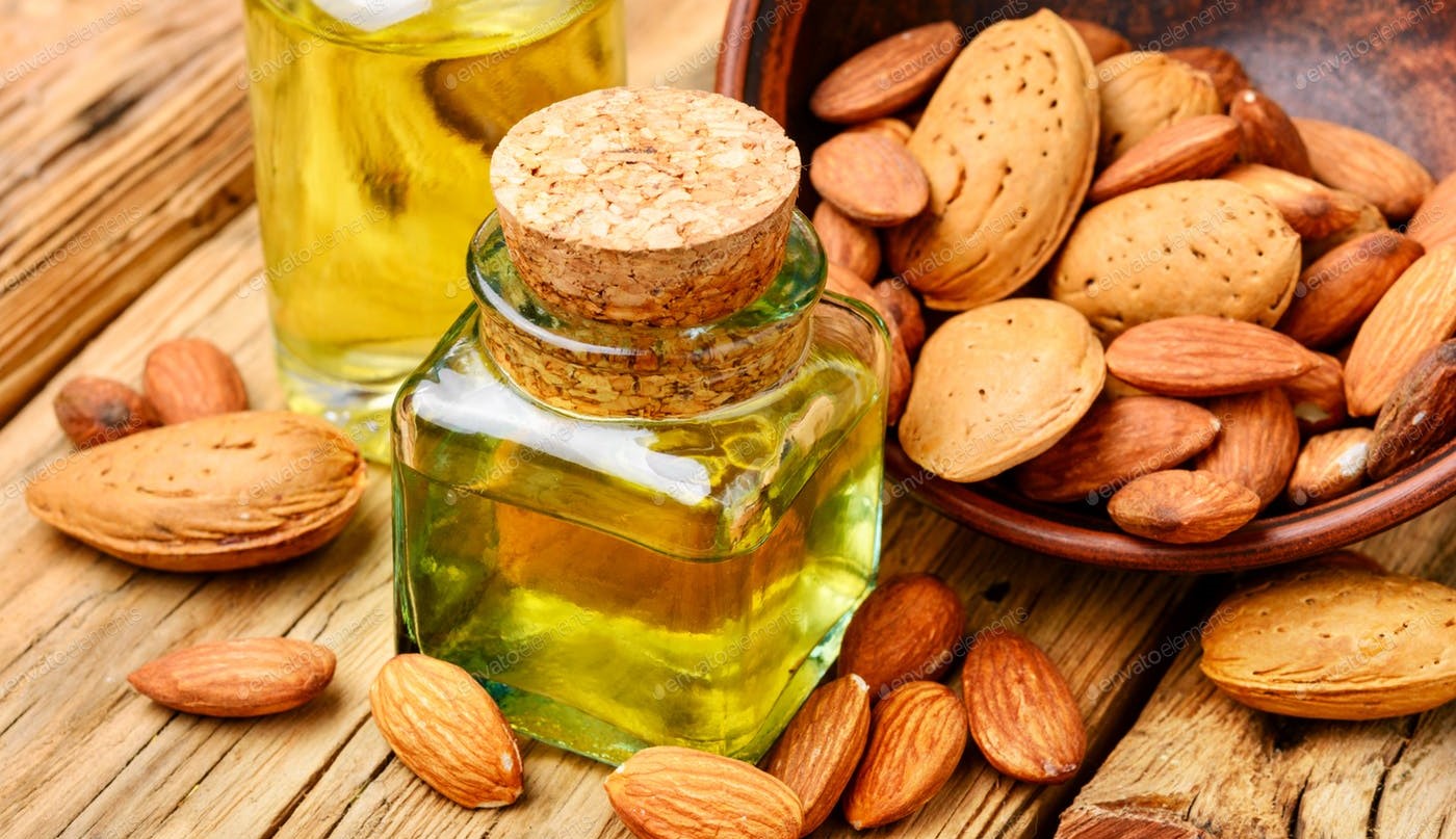 almond oil. - بهترین روغن ها برای درمان خشکی مو